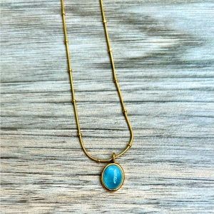 Aquamarine pendant necklace. 18K gold plated over silver.